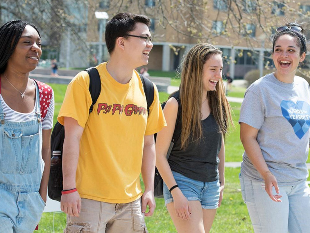 Photo of students walking on campus.